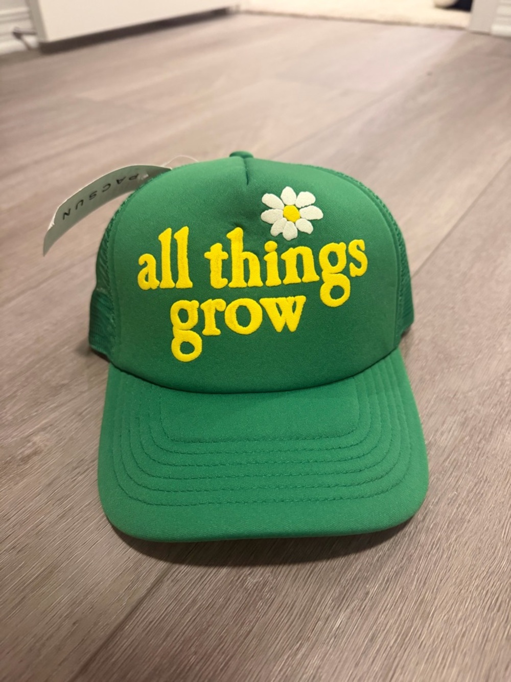 Green 'all things grow' Daisy Trucker Hat